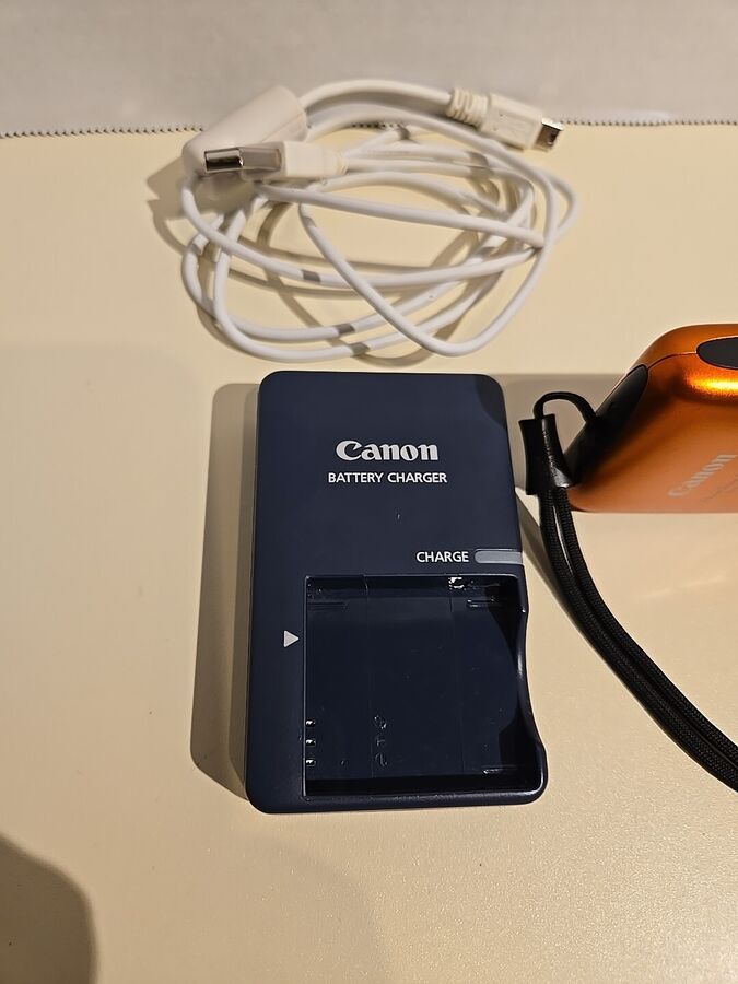 Canon PowerShot Digital ELPH SD1400 IS 14.1MP Digital Camera - Orange Working